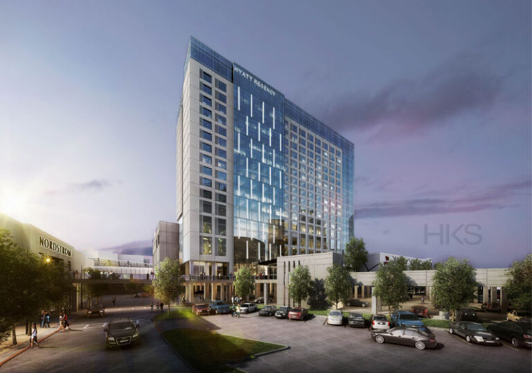 Modern Hyatt Regency Stonebriar hotel building at twilight with illuminated windows and surrounding street activity, celebrates topping out.