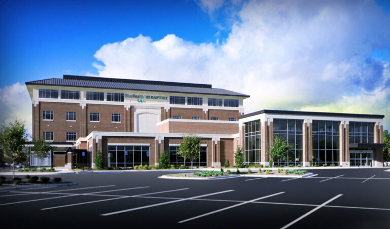 Modern multi-story Clinic of the Future with a large parking lot under a blue sky.
