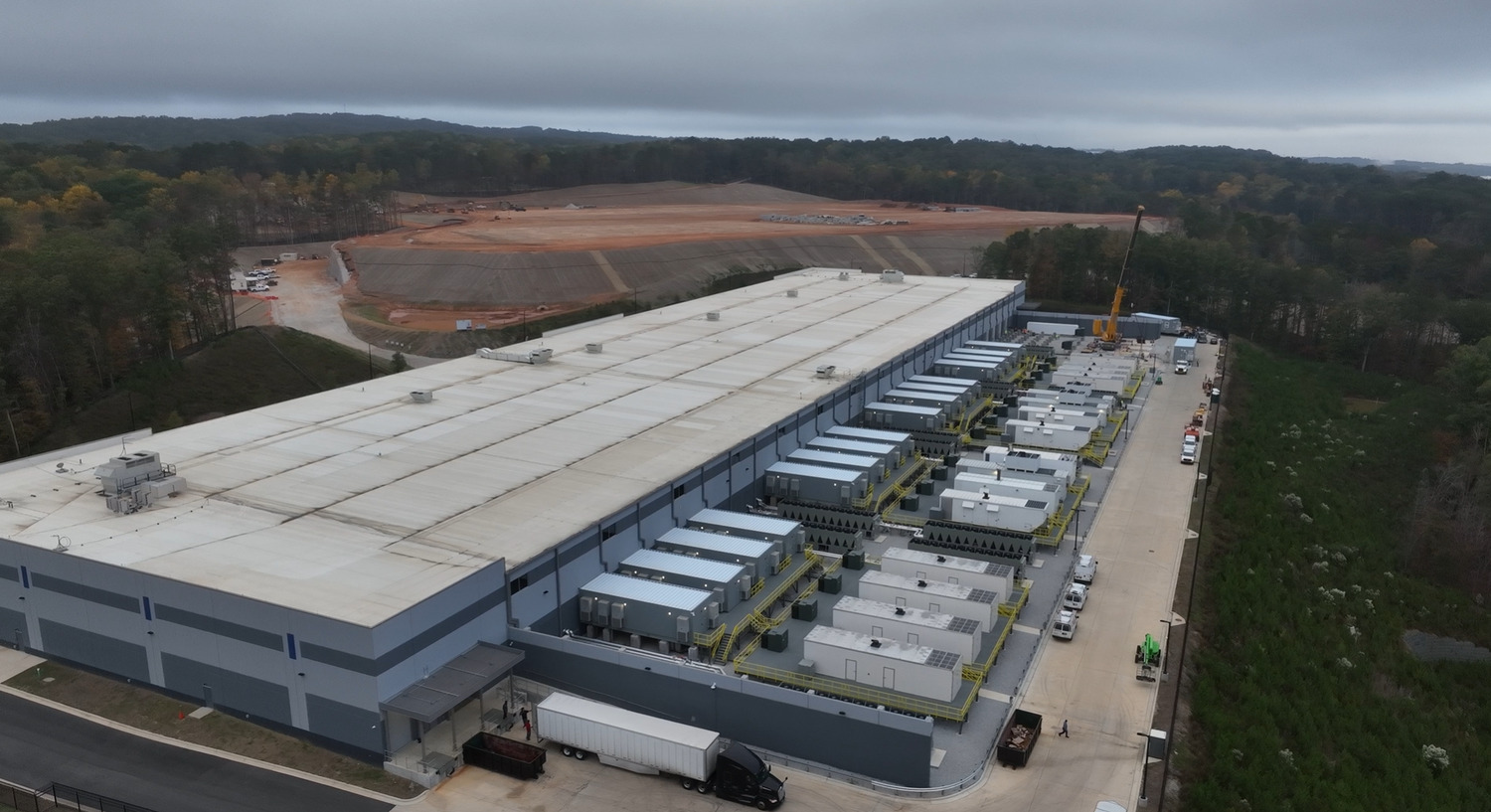 Progress photos from 11.6.2024 - Phase 4 completion, crane set for phase 5